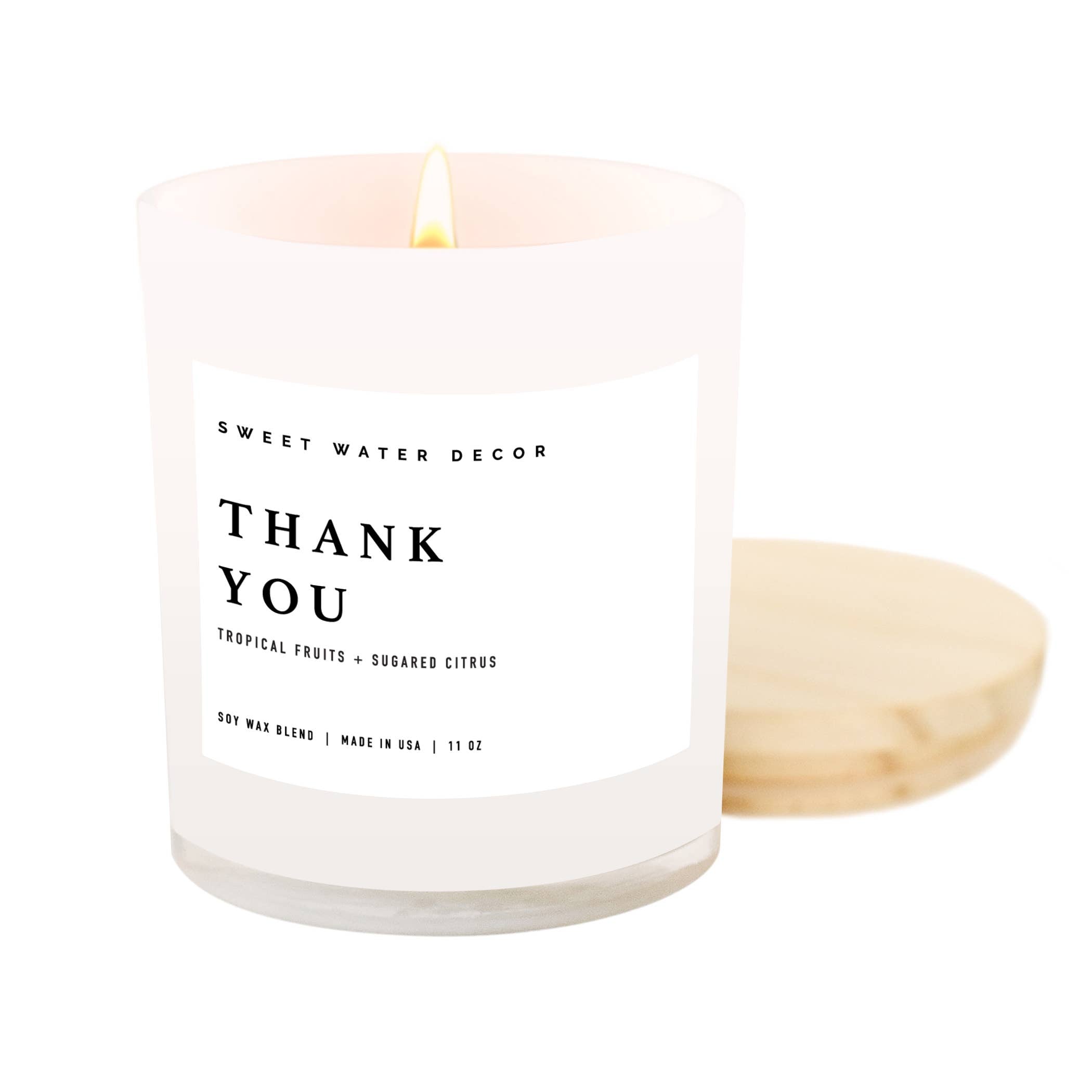 Blyskt Candle with 'Thank You' label and wooden wick on a white background