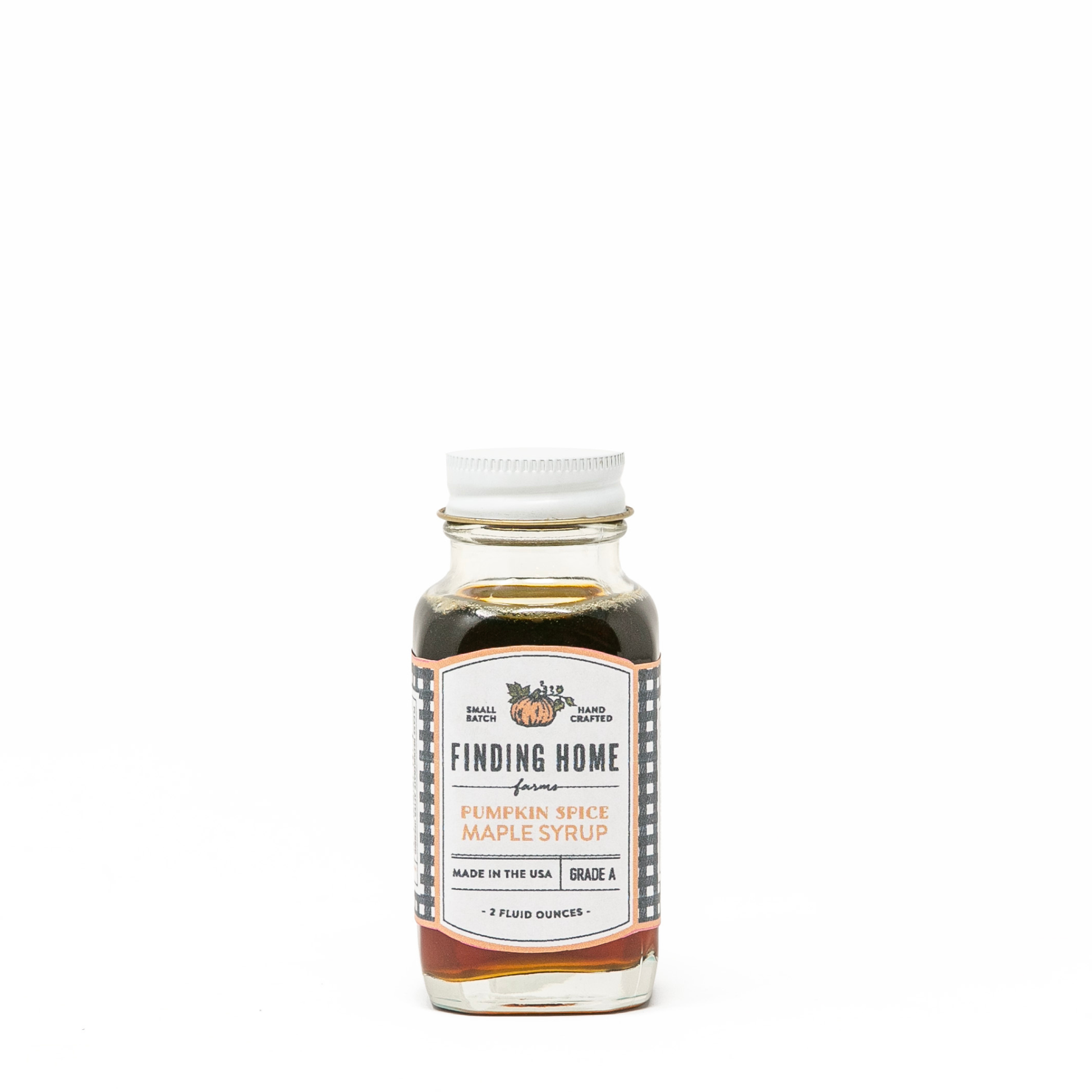 Blyskt Bottle of Finding Home Farms Pumpkin Spice Maple Syrup on a white background